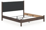 Pamytta King Upholstered Panel Bed angled view showing headboard and footboard