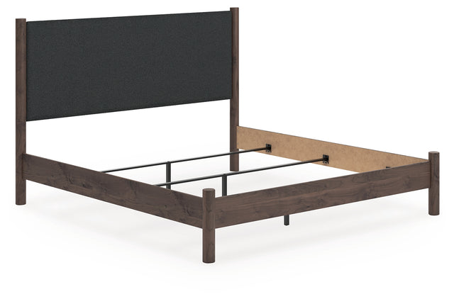 Pamytta King Upholstered Panel Bed angled view showing headboard and footboard
