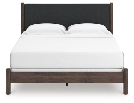 Front view of Pamytta King Upholstered Panel Bed showing upholstered headboard
