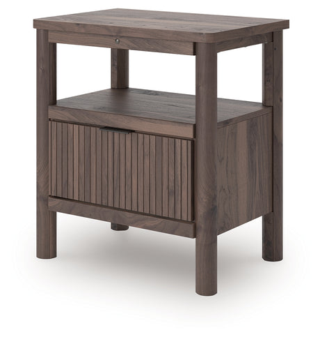 Side angle of Pamytta nightstand with ambient lighting on