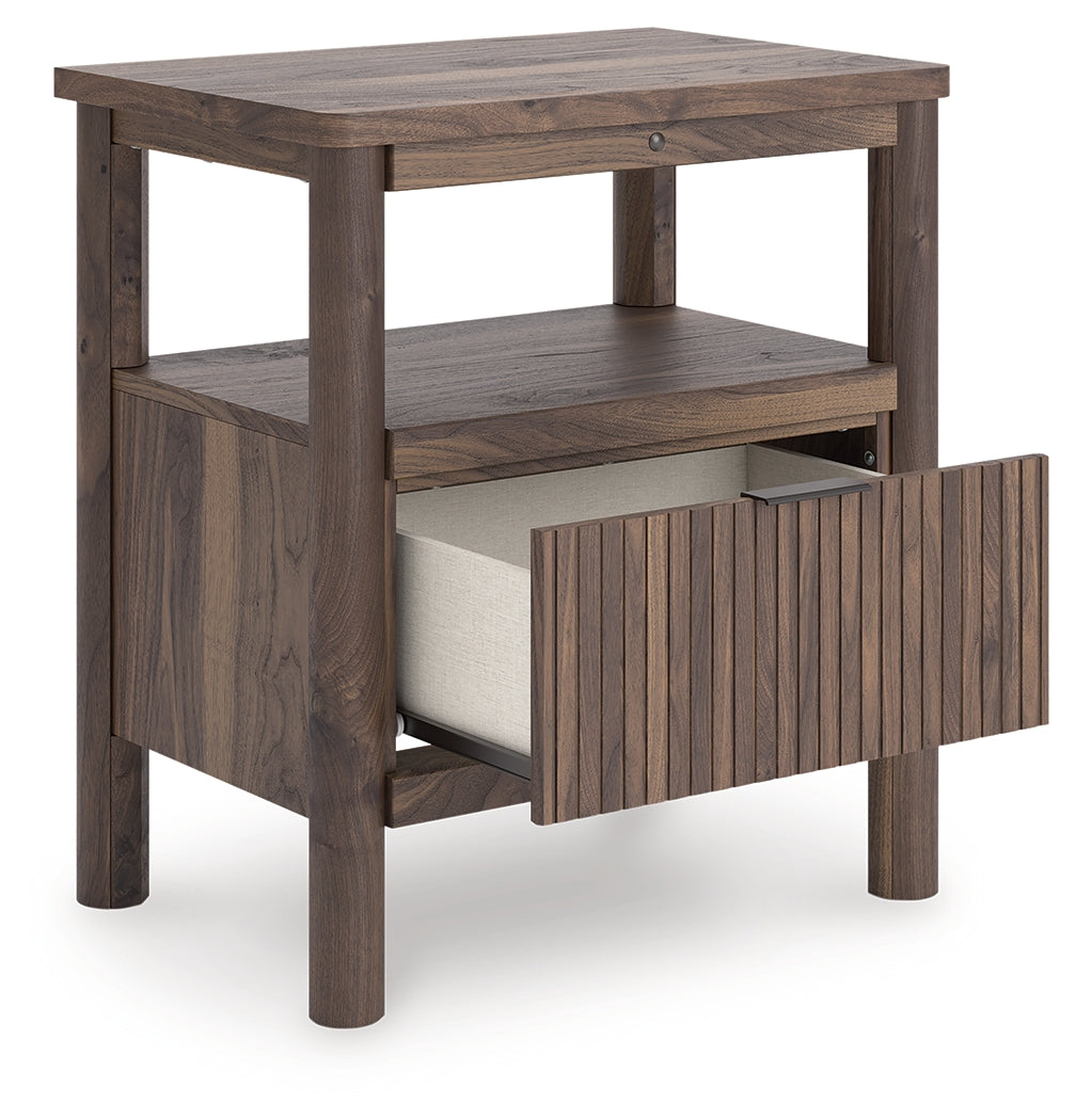 Open drawer of Pamytta nightstand with faux linen liner visible