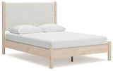 Cadmori bed side view with two-tone upholstery