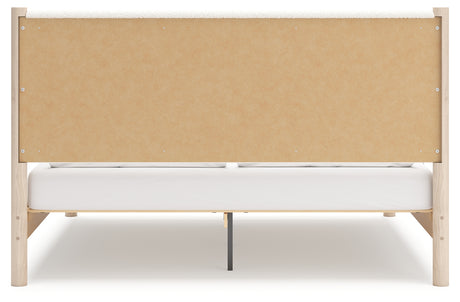 Back view of Cadmori two-tone king upholstered panel bed