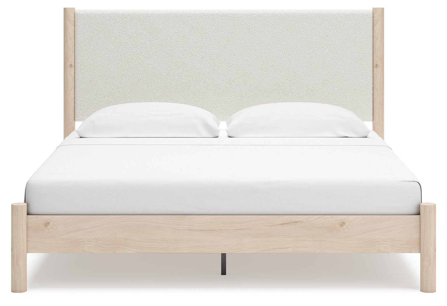 Head-on view of Cadmori king upholstered panel bed