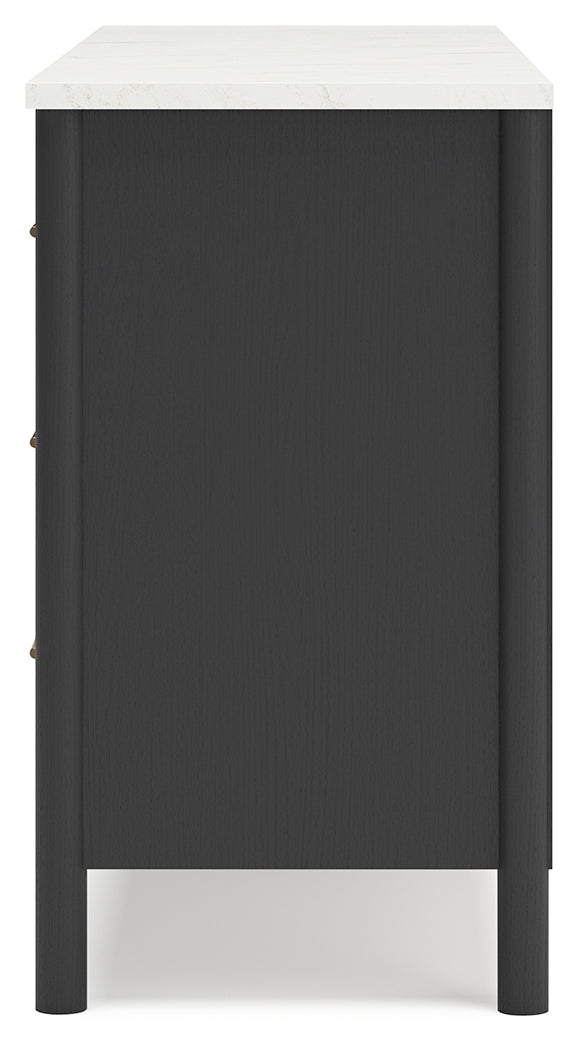 Side view of Cadmori Black and White Dresser