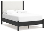 Side angle of Cadmori Full Upholstered Panel Bed highlighting black matte finish frame