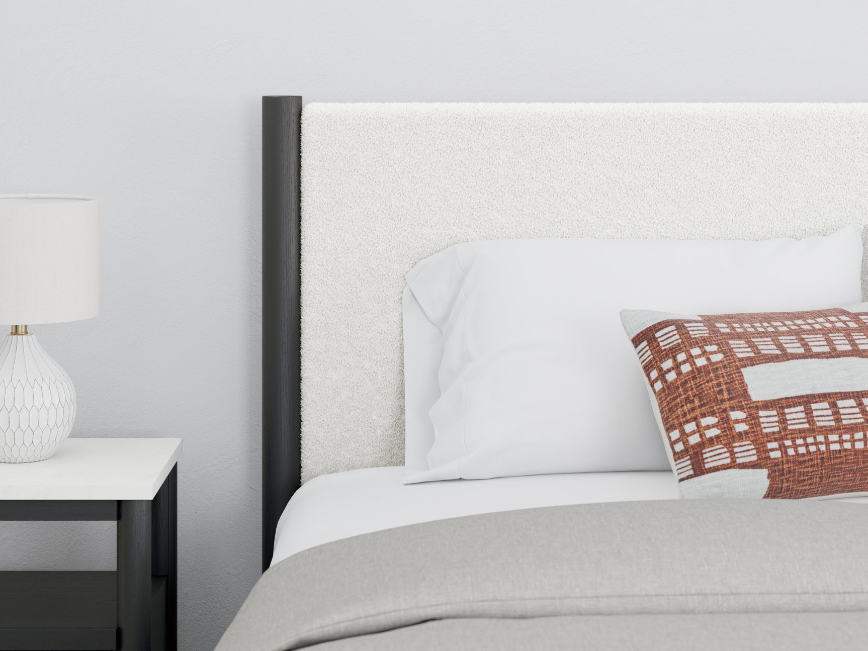 Cadmori Full Upholstered Panel Bed in black matte frame with white upholstery, front angle view