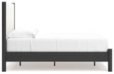 Cadmori Full Upholstered Panel Bed in black matte frame with white upholstery, front angle view