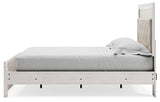 Altyra White Queen Upholstered Panel Bed corner view