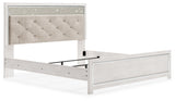 Altyra White King Panel Bed - upholstered headboard close-up