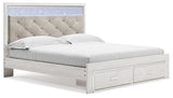 Altyra White King Upholstered Storage Bed angled side