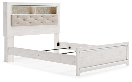 Altyra White Queen Panel Bookcase Bed - close-up of button tufting and chrome accents