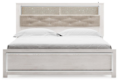 Altyra White King Panel Bookcase Bed head-on view showing shelf and chrome accents