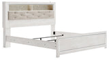 Altyra White King Panel Bookcase Bed angled view highlighting button tufted upholstery