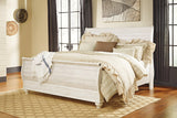 Willowton Whitewash Queen Sleigh Bed styled in bedroom setting