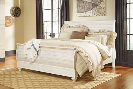 Willowton Whitewash Queen Sleigh Bed styled in bedroom setting