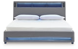 Top angle showing integrated speakers and audio controls