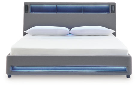 Top angle showing integrated speakers and audio controls
