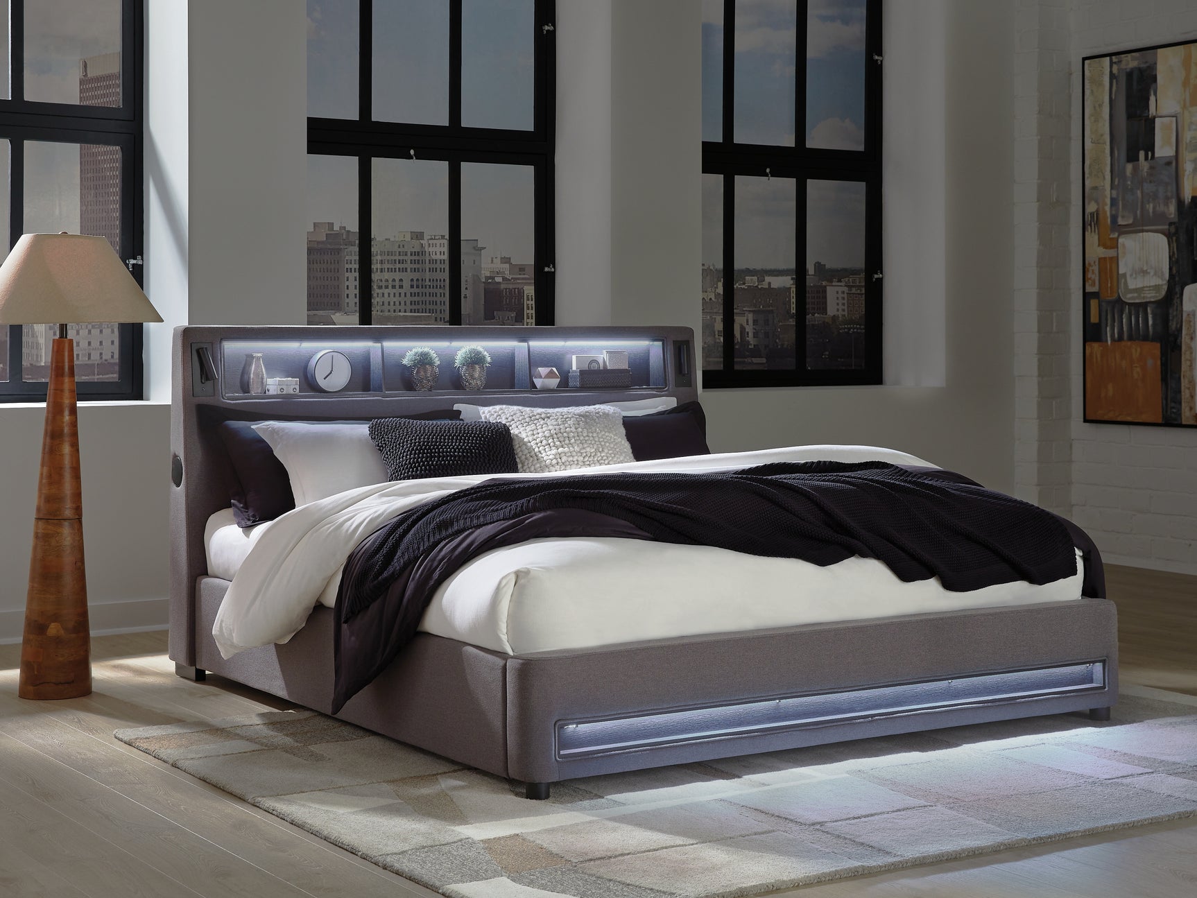 Integrated subwoofer speaker under bed