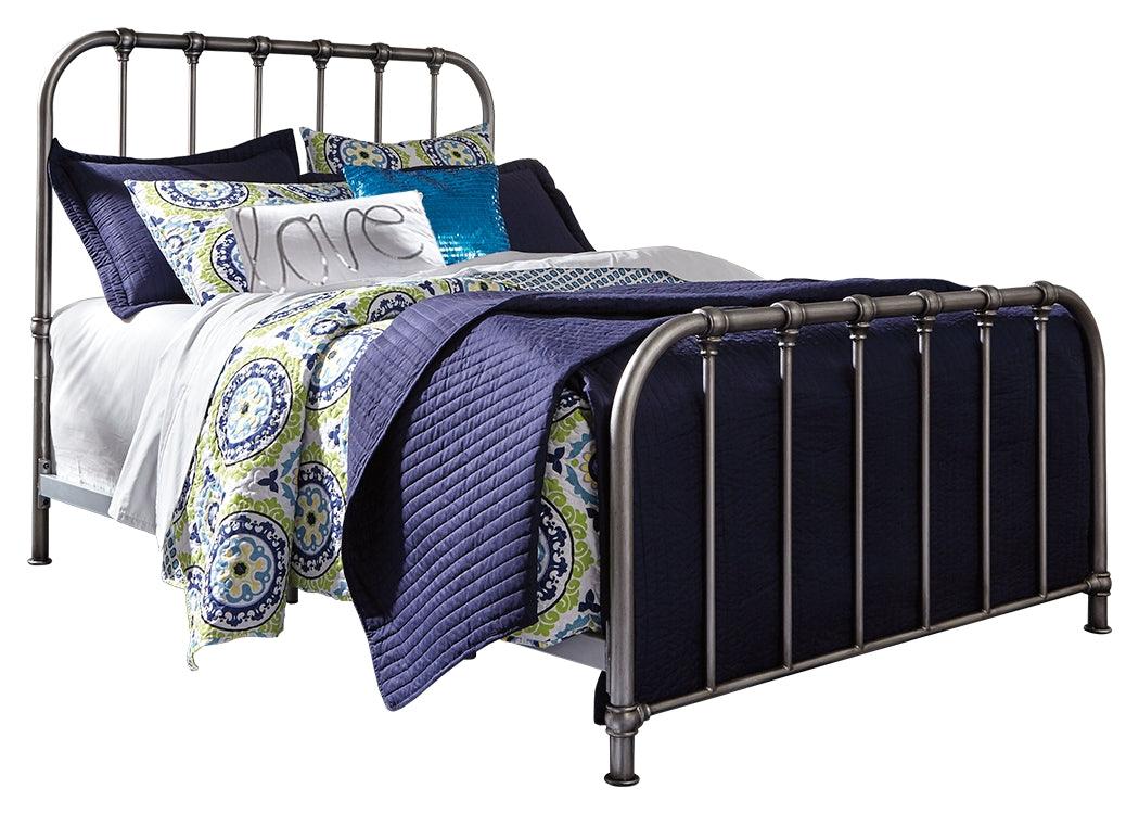 Nashburg Black Queen Metal Bed styled in bedroom