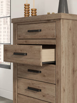 Close-up of dark bronze-tone hooded drawer pull