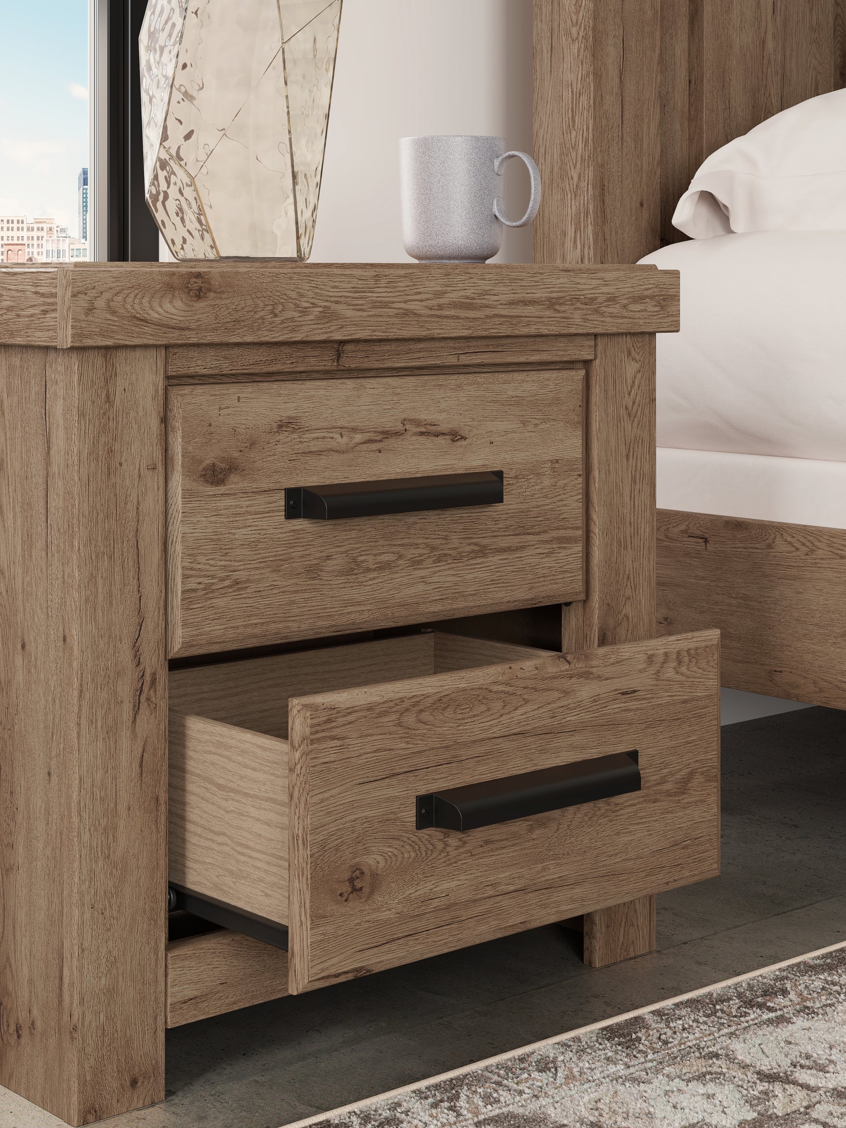 Close-up detail of drawer pull and wood finish