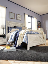 Bellaby Whitewash Queen Crossbuck Panel Bed styled in bedroom