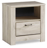 Side profile of Bellaby Whitewash Nightstand with storage cubby