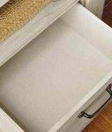 Interior of Bellaby Nightstand drawer lined with faux linen laminate
