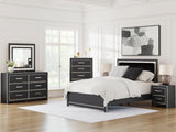 Zuraleus chest of drawers staged with matching bedroom furniture