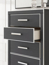 Side profile of Zuraleus black chest of drawers