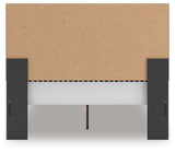 Detail of tufted upholstered headboard