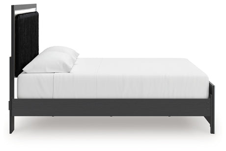 Side view of Zuraleus King Upholstered Bed
