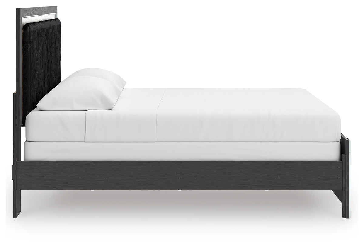 Side profile of Zuraleus king upholstered bed