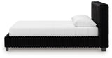 Zuraleus Black Queen Upholstered Panel Bed side view