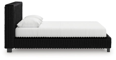 Zuraleus Black Queen Upholstered Panel Bed detailed upholstery close-up