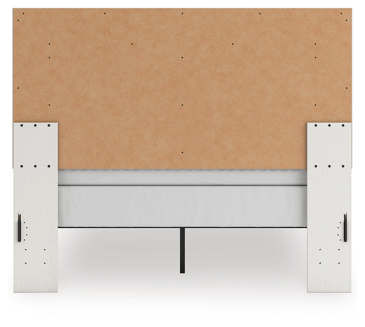 Zuraleus queen upholstered panel bed side alternate angle