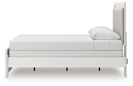 Zuraleus queen upholstered panel bed headboard detail