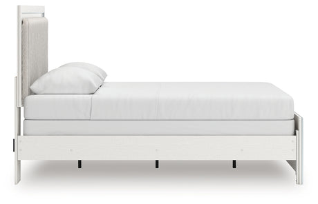 Zuraleus queen upholstered panel bed back view