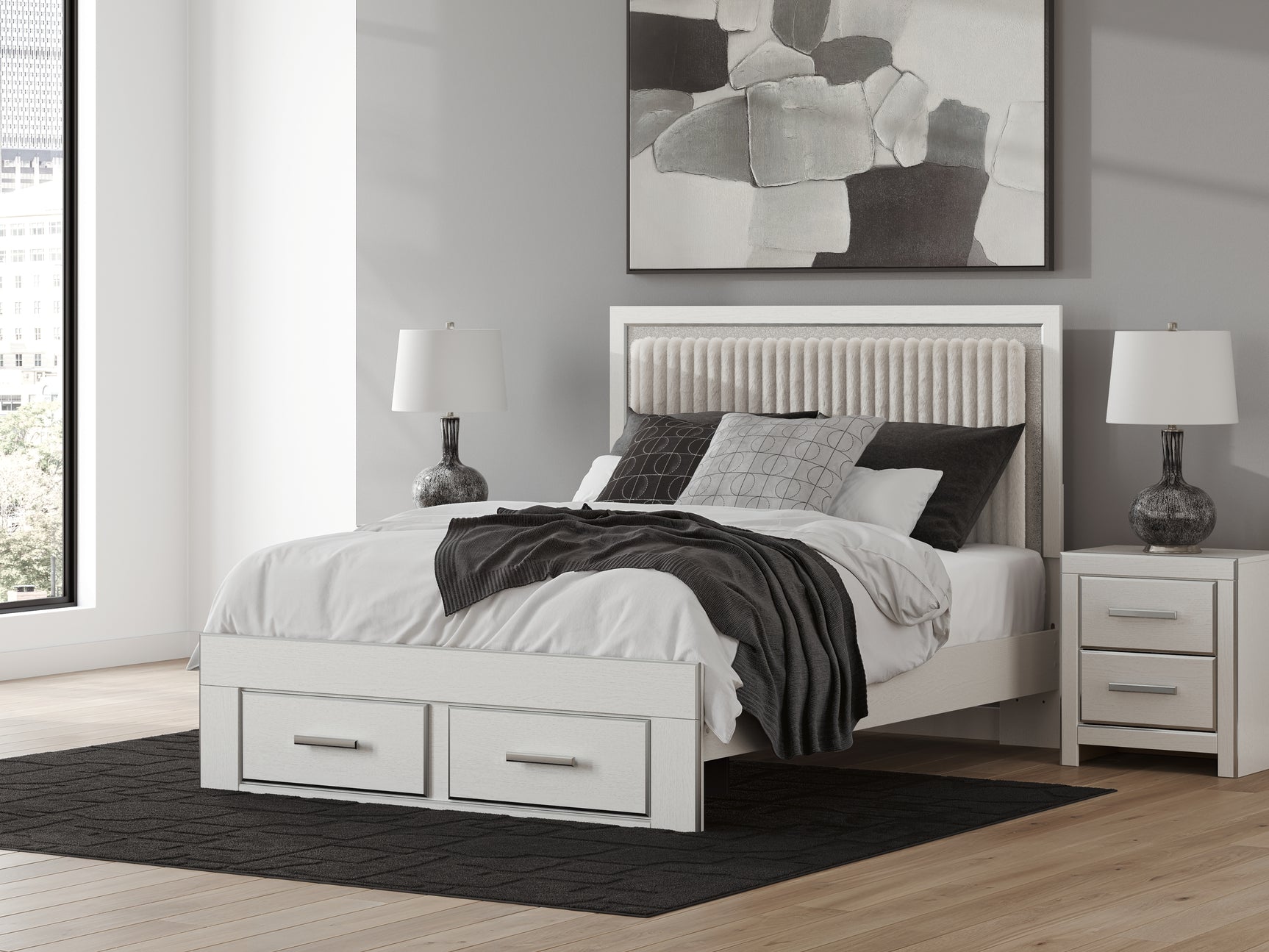Queen-sized bed showing storage drawers open
