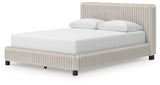 Alternate angle of Zuraleus queen bed in white upholstery
