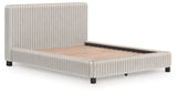 Side view of Zuraleus queen upholstered bed
