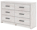 Side angled view of Cayboni whitewash dresser