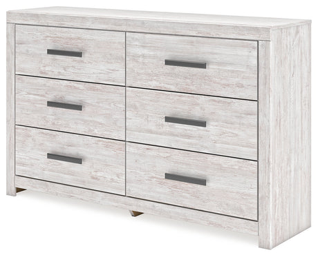 Side angled view of Cayboni whitewash dresser