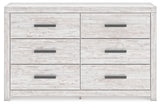 Head-on view of Cayboni whitewash dresser