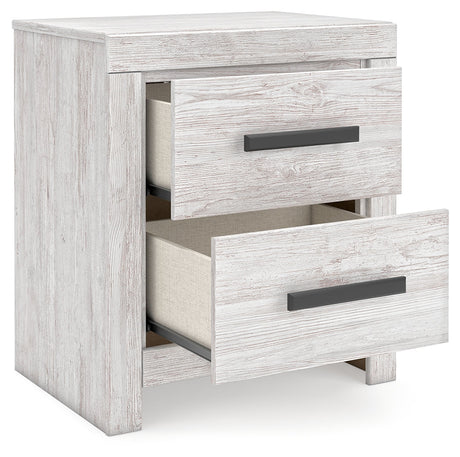 Cayboni Nightstand with one drawer open showing storage space