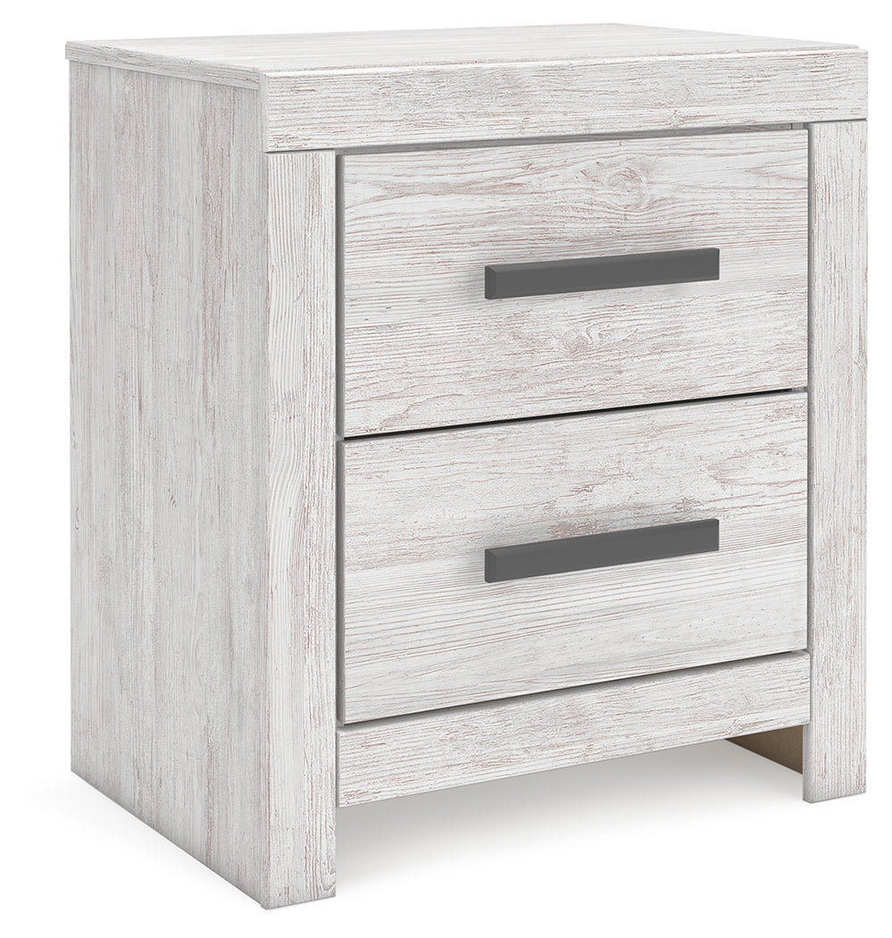 Cayboni Whitewash Nightstand angled side view showing drawer fronts
