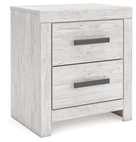 Cayboni Whitewash Nightstand angled side view showing drawer fronts