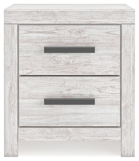 Head-on view of Cayboni Whitewash Nightstand