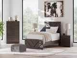 Prendonea Charcoal Twin Panel Bed staged in bedroom